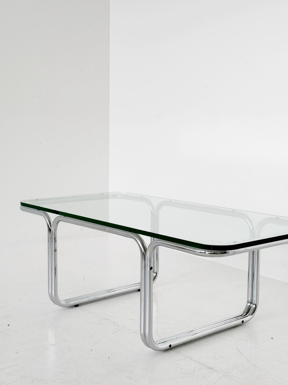 Rectangular coffee table in glass and chrome-plated steel, attributed to Gruppo DAM – Italy, 1970s