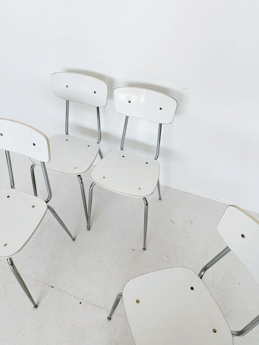 Four formica chairs