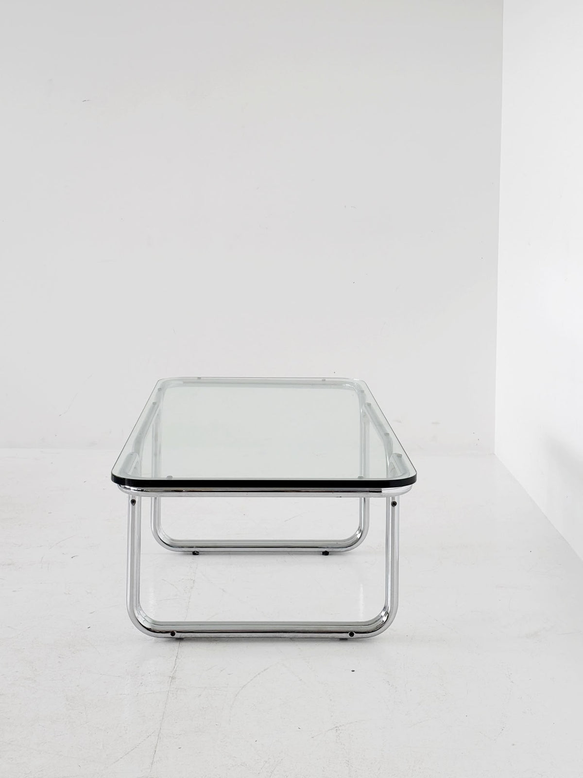 Rectangular coffee table in glass and chrome-plated steel, attributed to Gruppo DAM – Italy, 1970s