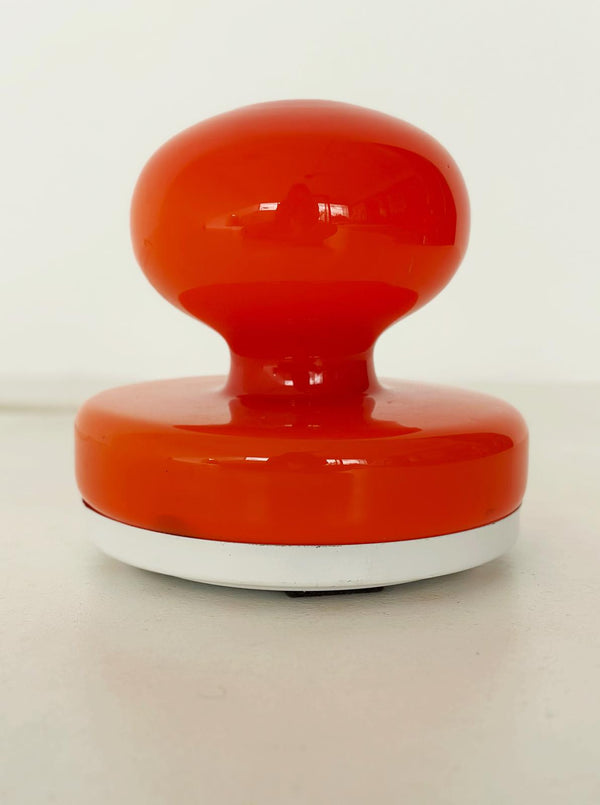 Orange table lamp with white base