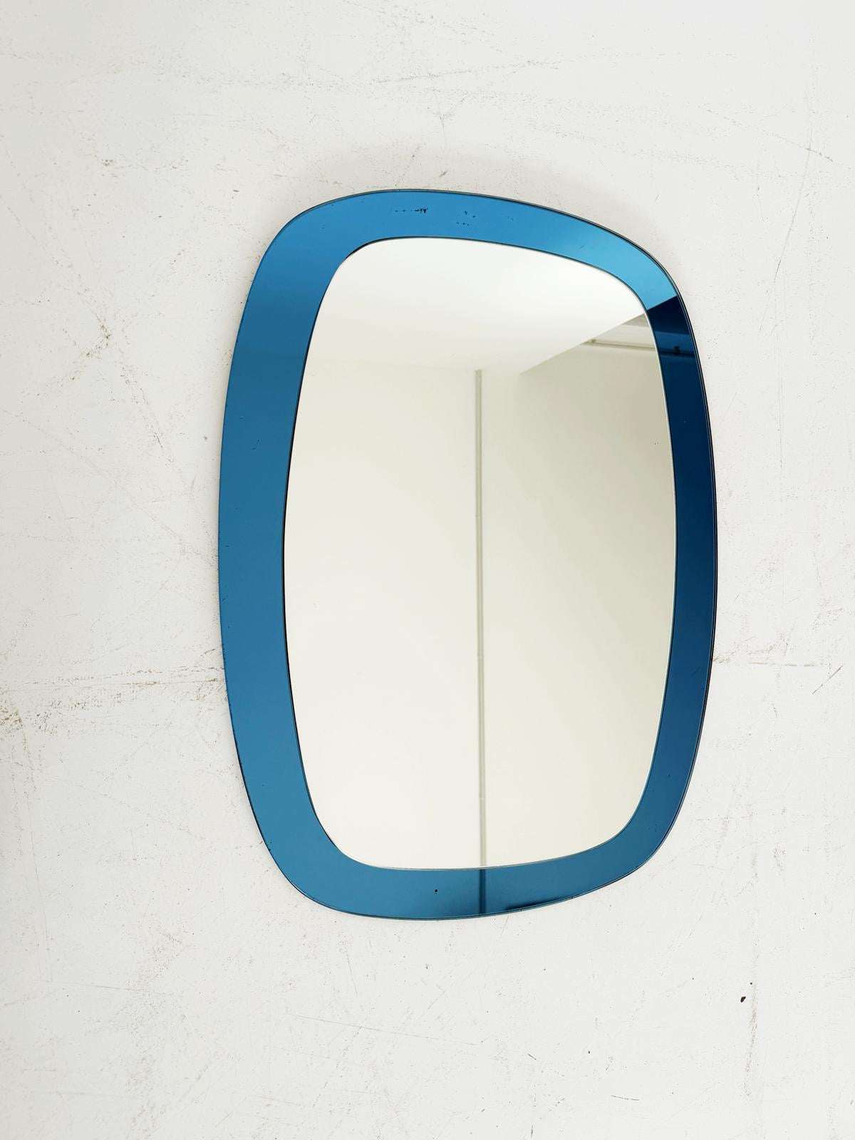 Shaped mirror with blue glass frame – Italian production, 1970s