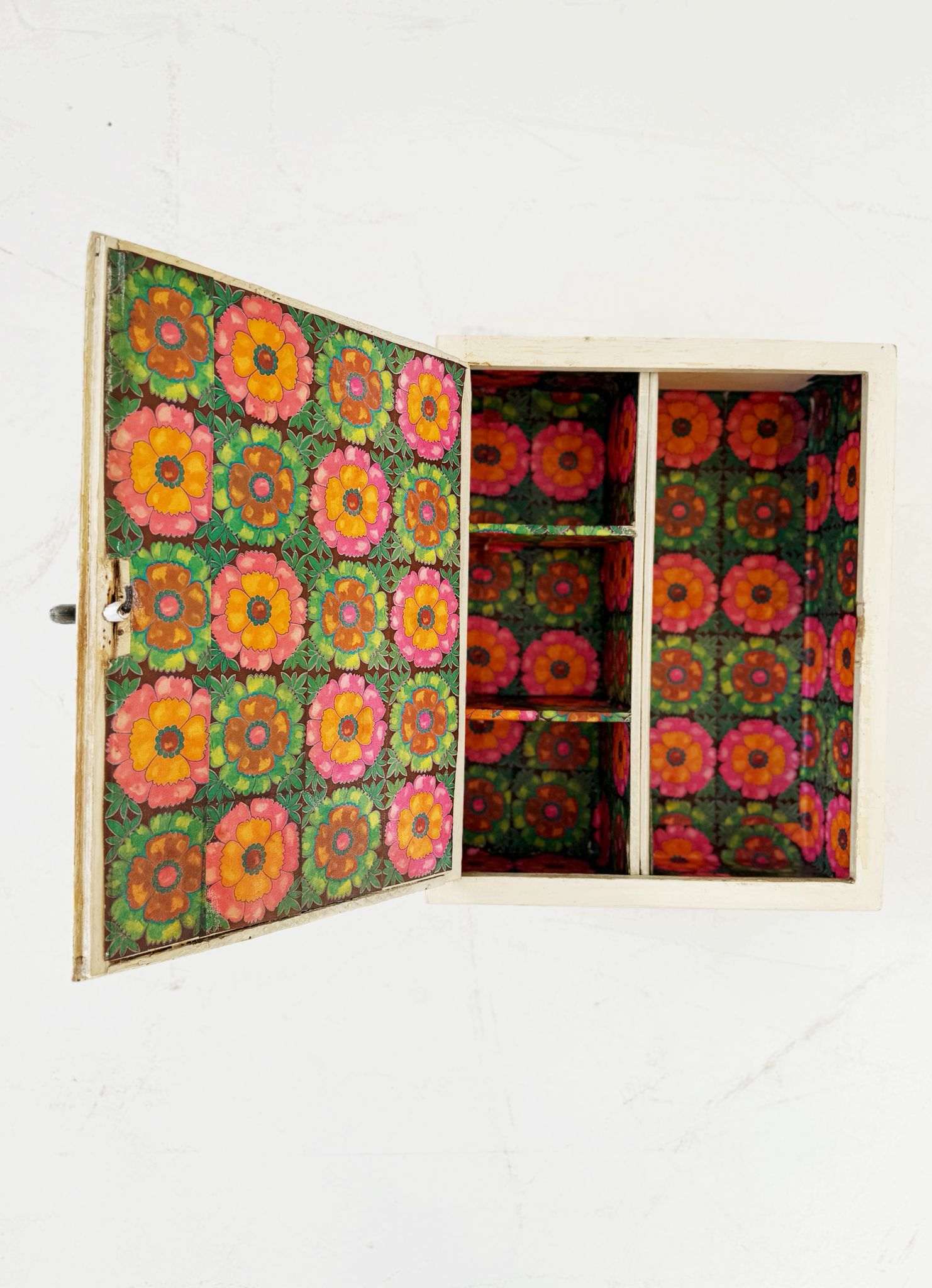 Wall-mounted cabinet with mirrored door and interior covered in decorated paper – Italy, 1950s/early 1960s