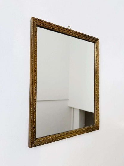 Rectangular mirror with carved gilded frame