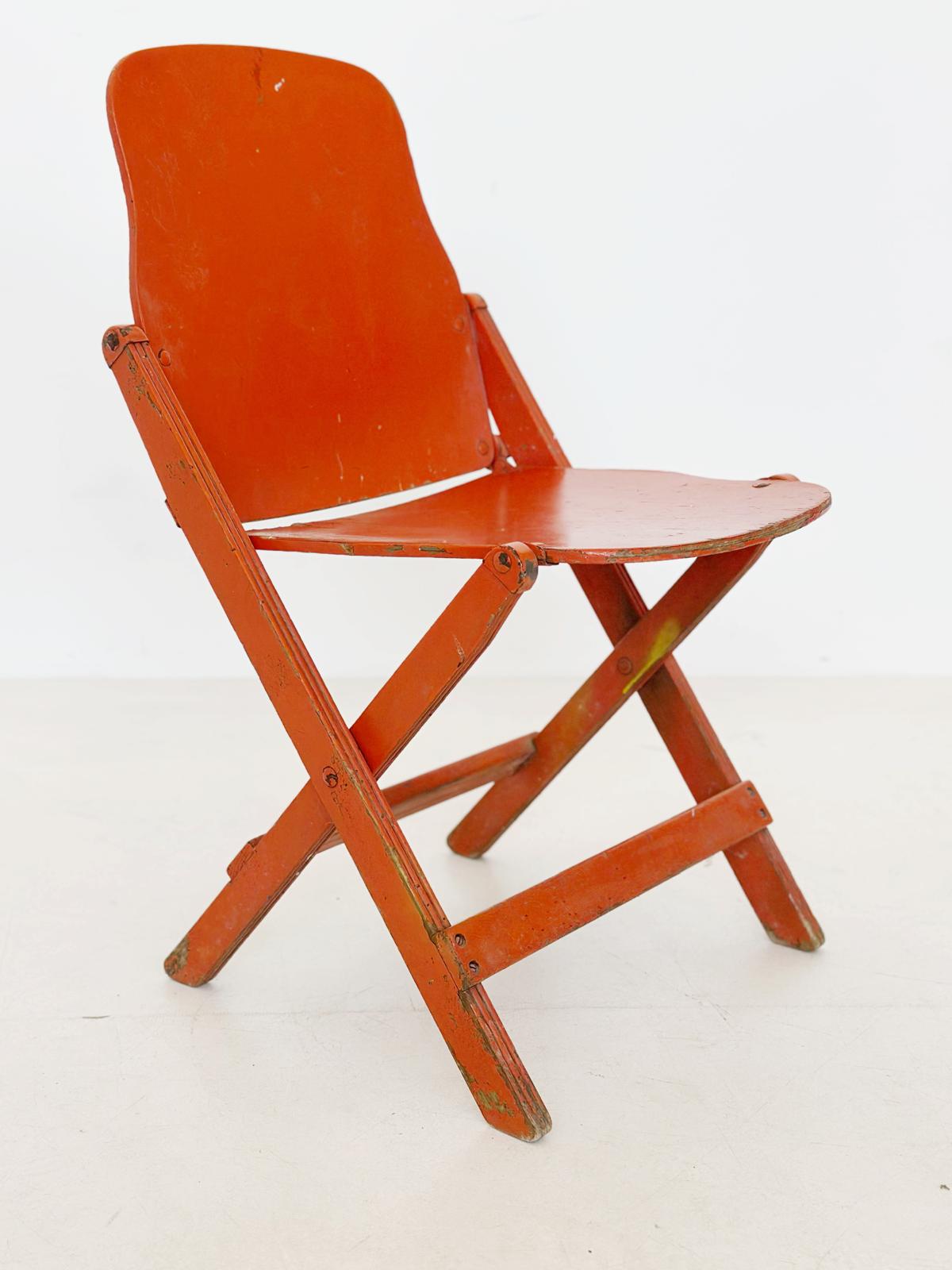 Folding orange chair