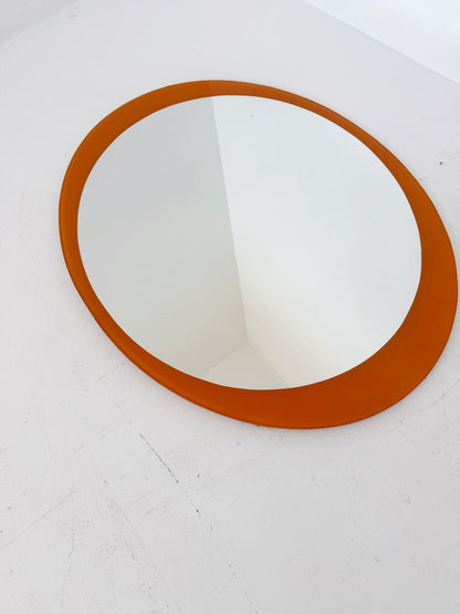 Oval mirror with orange back-painted glass frame, 1970s