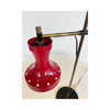 Red and brass table lamp