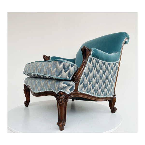 Light blue and wood armchair