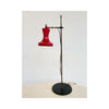Red and brass table lamp